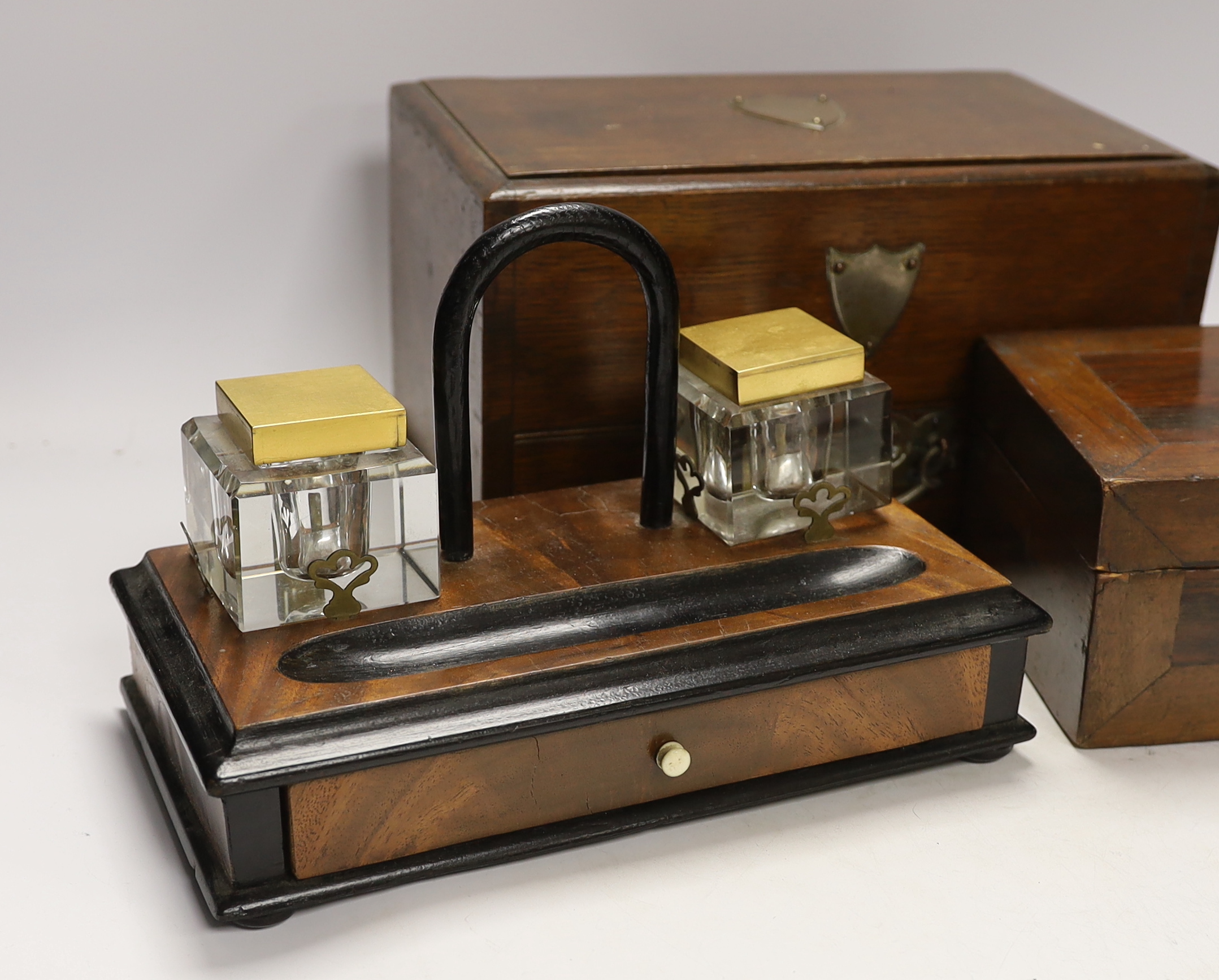 A walnut inkstand, an oak strong box and a rosewood box, 30cm x 18cm high